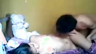 Young Couple Kissing And Touching Each Other In Intimate Foreplay