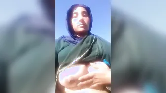 Voluptuous Village Wife Showing Off Massive Boobs In Open Field