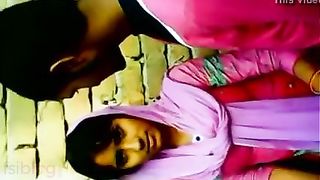 Youthful pair enjoy outdoor kiss and foreplay infront of ally