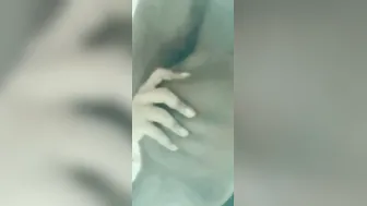 Curly Haired Babe Showing Off Her Perky Tits On Private Video