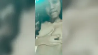 Curly Haired Babe Showing Off Her Perky Tits On Private Video