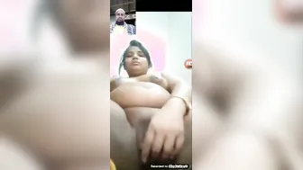 Bored Wife Playing With Toy While Husband Works Late Night