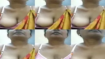 Milf Aunty Pulling Her Saree Aside Revealing Big Boobs For Me
