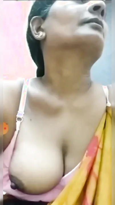 Milf Aunty Pulling Her Saree Aside Revealing Big Boobs For Me