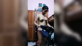 Hot Indian Babe Getting Dressed After Sex Caught On Hidden Cam