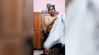 Hot Indian Babe Getting Dressed After Sex Caught On Hidden Cam