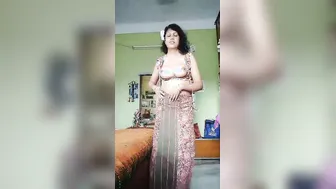 Indian Babe Stripping Naked Showing Tits And Shaved Pussy