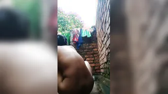 Bhabhi Bathing Completely Nude In Open Backyard Caught On Camera