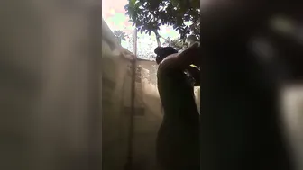 Village Girl Bathing Topless Caught On Camera Going Viral