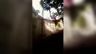 Village Girl Bathing Topless Caught On Camera Going Viral