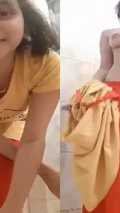 Teen College Babe Going Topless In The Bathroom Alone