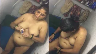 Secretly Filmed Aunty Rubbing Cream On Herself In Bathroom