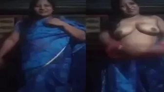 Housewife Unwrapping Her Saree Revealing Big Juicy Tits At Home