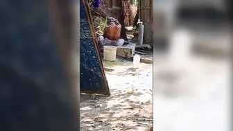 Village Wife Bathing Naked Outdoors Filmed On Hidden Camera
