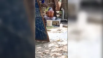 Village Wife Bathing Naked Outdoors Filmed On Hidden Camera