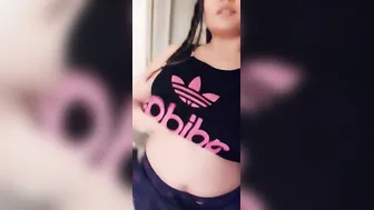 Hot Babe Pulling Up Shirt Revealing Her Big Round Tits For You