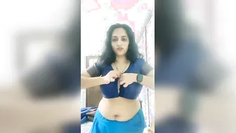 Busty Aunty Stripping Off Her Blouse Revealing Her Huge Tits