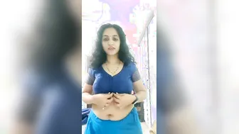 Busty Aunty Stripping Off Her Blouse Revealing Her Huge Tits