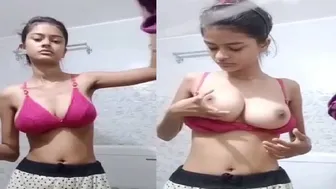 Teenage Babe Unhooking Pink Bra Revealing Her Big Boobs