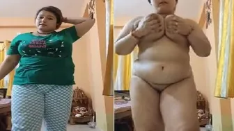 Chubby Wife Getting Naked Squeezing Her Big Tits In Bedroom