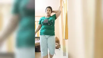 Chubby Wife Getting Naked Squeezing Her Big Tits In Bedroom