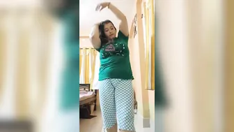 Chubby Wife Getting Naked Squeezing Her Big Tits In Bedroom