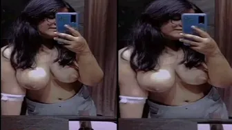 Desi Babe Showing Off Her Plump Natural Tits In The Mirror