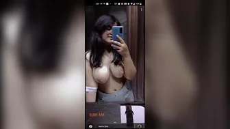 Desi Babe Showing Off Her Plump Natural Tits In The Mirror