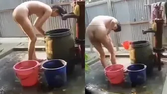 Village Girl Caught Bathing Naked In Outdoor Viral Clip