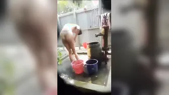 Village Girl Caught Bathing Naked In Outdoor Viral Clip