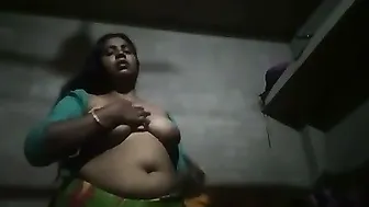 Mature Aunty Revealing Massive Tits Removing Blouse In Home Clip