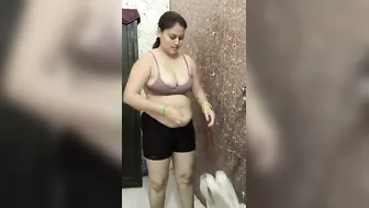 Mature Aunty Undressing Slowly Before Bathing On Camera