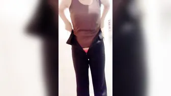 Covering Her Face While Fingering Pussy In Public Toilet Stall