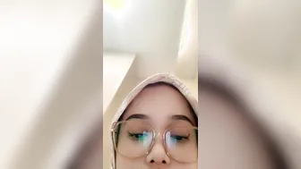 Covering Her Face While Fingering Pussy In Public Toilet Stall