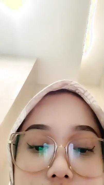 Covering Her Face While Fingering Pussy In Public Toilet Stall