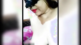 Naughty Bhabhi Wearing Mask Using Dildo Then Pissing On Floor