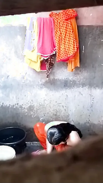 Bhabhi Next Door Bathing Recorded Through Window Looking Hot