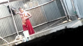 Spying On Neighbor Aunty Bathing Naked Through Bathroom Gap