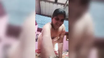 Mature Aunty Drops Towel Revealing Her Wet Pussy On Camera