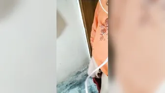 Glasses Wearing Cutie Stripping Down Talking Dirty For Boyfriend