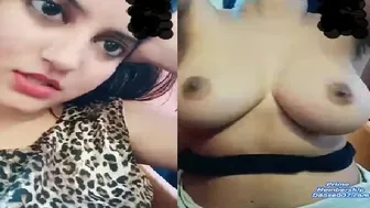 Hot Babe Playing With Her Massive Boobs On Camera