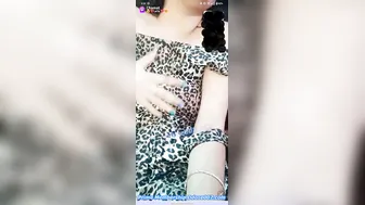 Hot Babe Playing With Her Massive Boobs On Camera