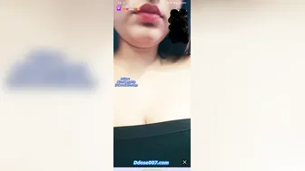 Hot Babe Playing With Her Massive Boobs On Camera