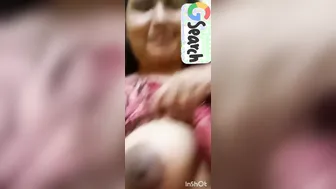 Aunty Exposing Her Huge Round Tits In This Private Home Video