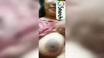 Aunty Exposing Her Huge Round Tits In This Private Home Video