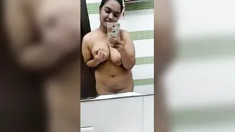 Busty Girl Posing Completely Naked In Front Of Her Mirror