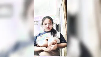 Chubby Indian Babe Playing With Her Huge Tits Going Topless