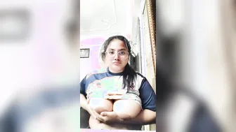 Chubby Indian Babe Playing With Her Huge Tits Going Topless