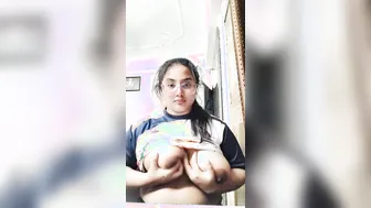 Chubby Indian Babe Playing With Her Huge Tits Going Topless