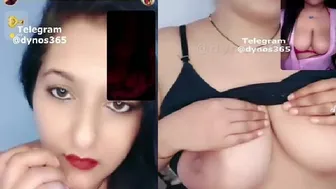 Busty Camgirl Stripping Topless Showing Huge Tits On Video